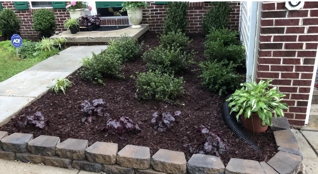After mulch installation - brick house front bed with fresh mulch